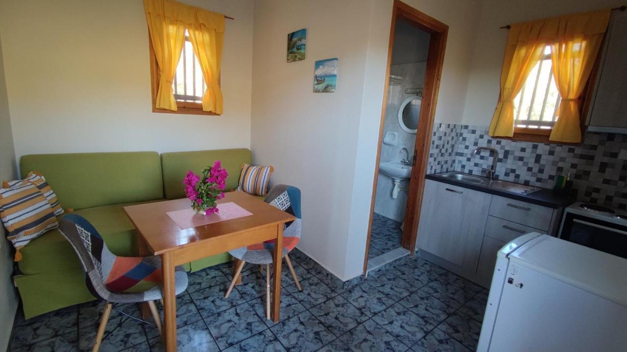 Appartement Tramonto Nel Delfini à Kini Extérieur photo